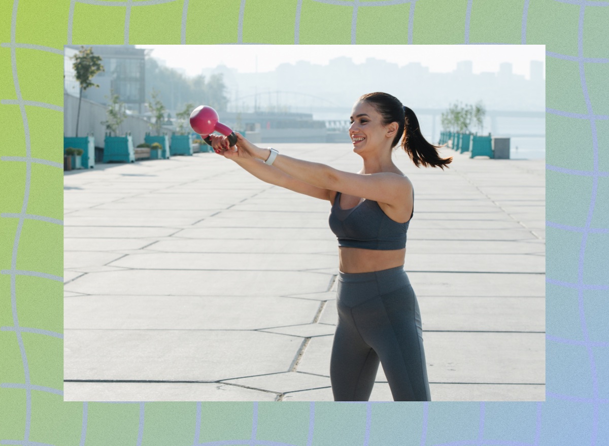 fit woman doing kettlebell swing exercise outdoors