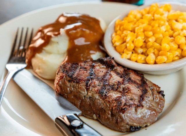 logan's roadhouse mesquite-grilled steak, corn, and mashed potatoes