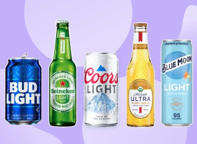 five low calorie beers on a purple background