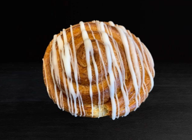 peet's coffee cinnamon roll on a black background