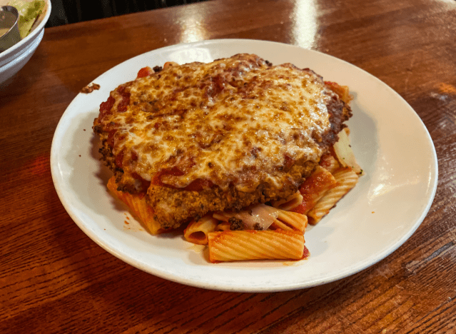 pizzeria uno chicken parm over pasta 