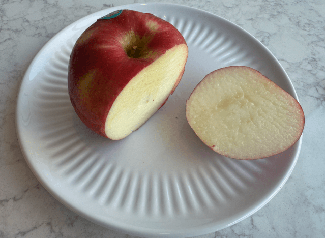 rave apple cut open on a plate 