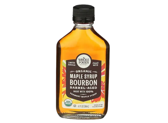 a bottle of whole foods maple syrup