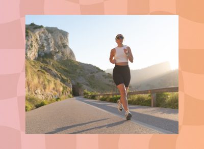 fit woman running outdoors through the mountains