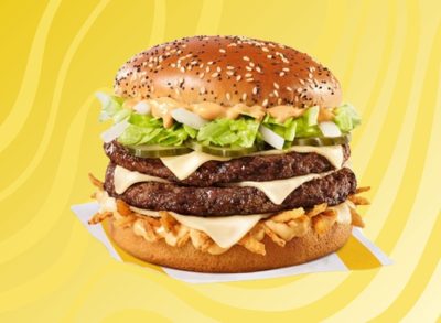 McDonald's Big Arch burger on yellow background