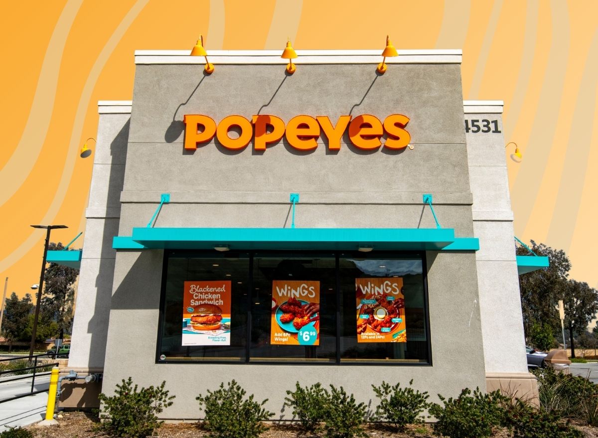 Popeyes exterior on colorful orange background