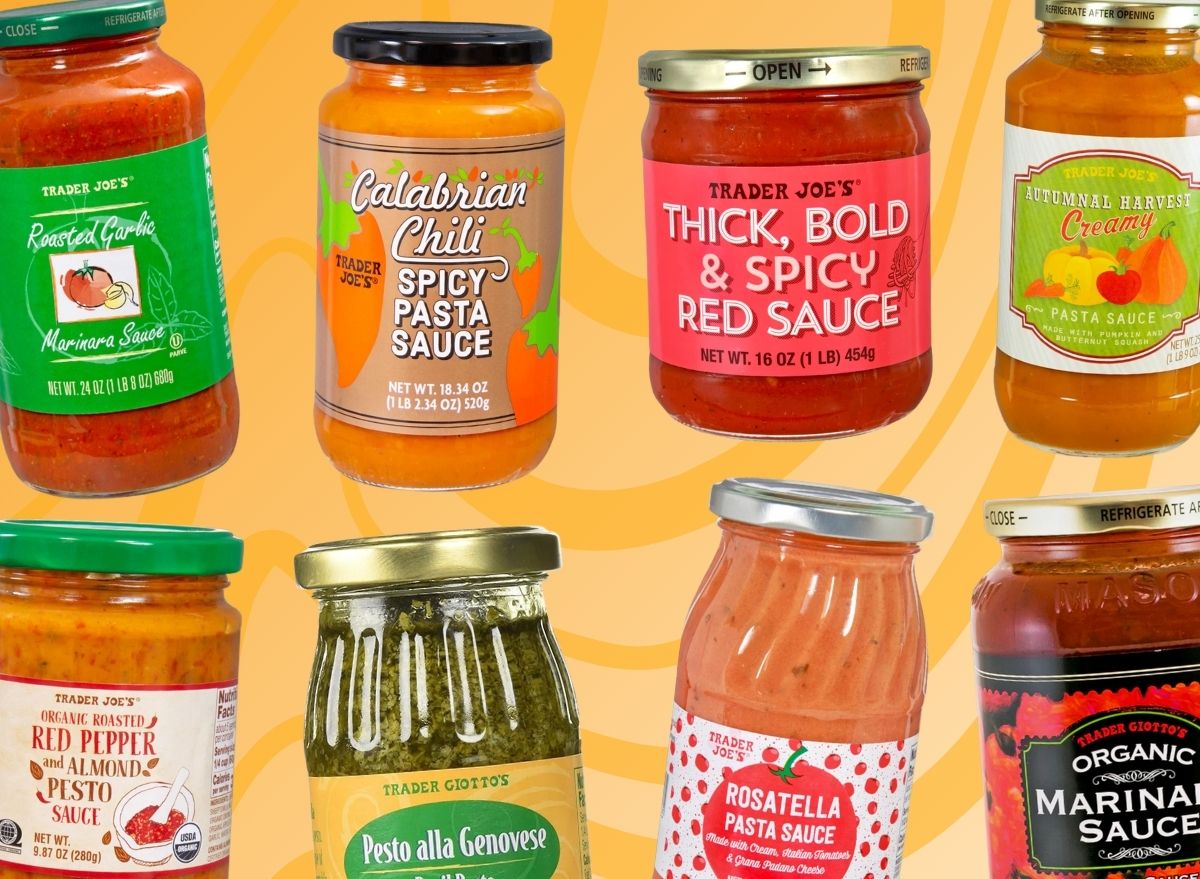 An array of Trader Joe's pasta sauces set against a vibrant swirly background.