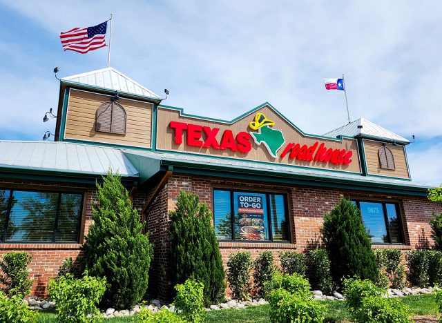 The storefront of a Texas Roadhouse restaurant in Manassas, Va.