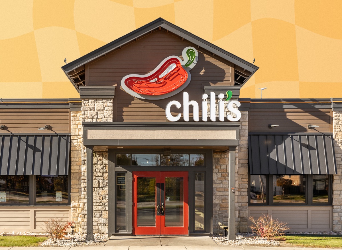 exterior of Chili's on yellow square background design