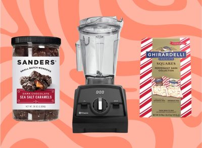 Sanders Dark Chocolate Sea Salt Caramel, Vitamix Venturist Pro Blender, and Ghirardelli Peppermint Squares set against a red background