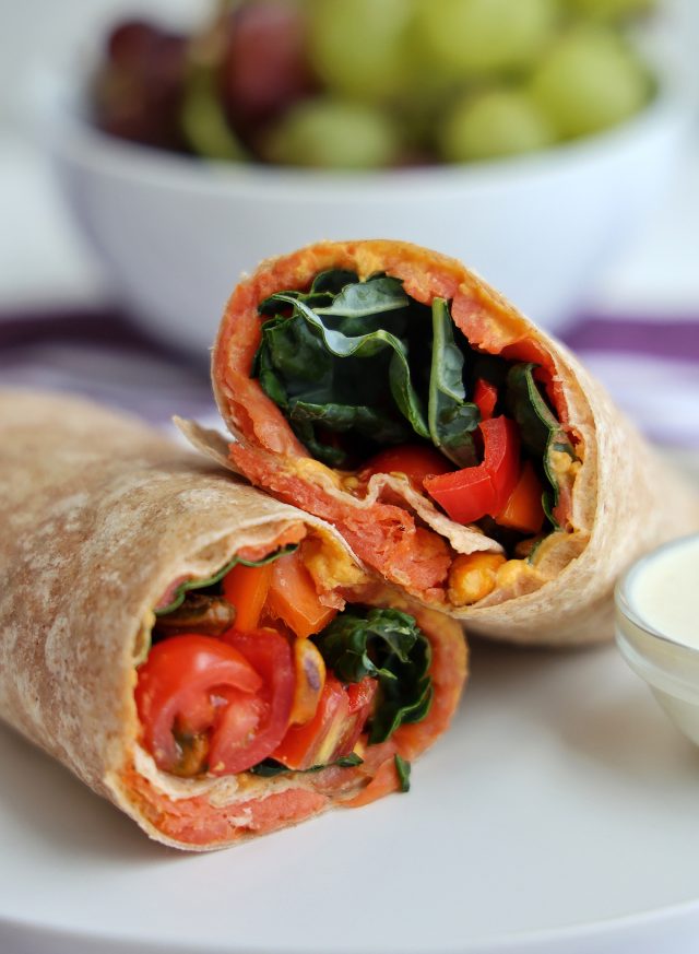 high protein vegetarian smoked salmon recipe on a white plate with grapes in the background