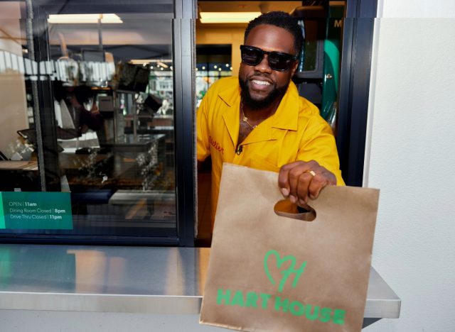 kevin hart holding hart house bag at drive-thru