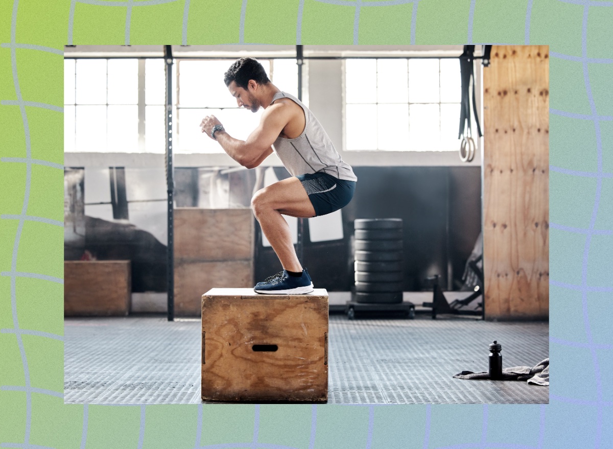 fit man doing box jumps at the gym