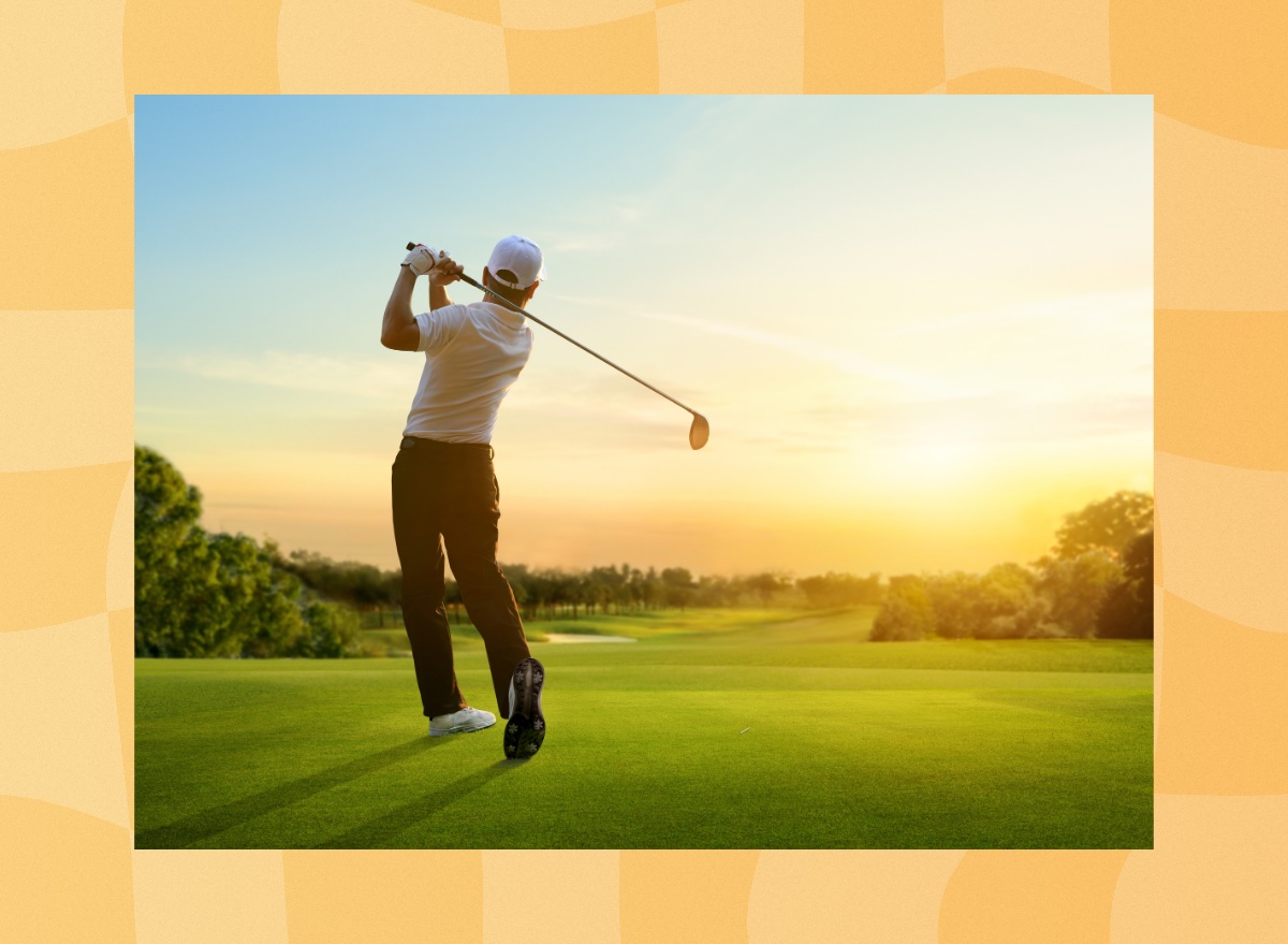 man golfing at sunset