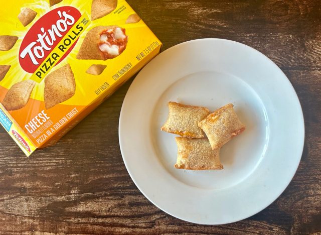 Totino's Cjeese Pizza Rolls on a plate next to a bag of the product