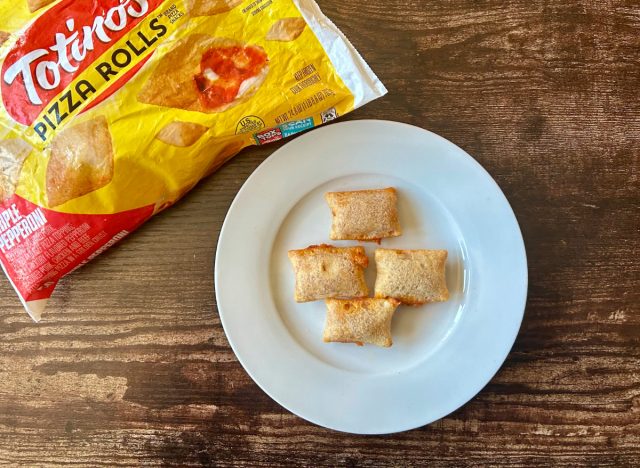 Totino's Pepperoni Pizza Rolls on a plate next to a bag of the product