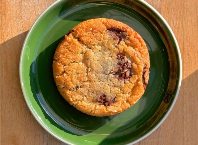 Warda Patisserie's Halvah & Chocolate Chunk Cookie on a green plate