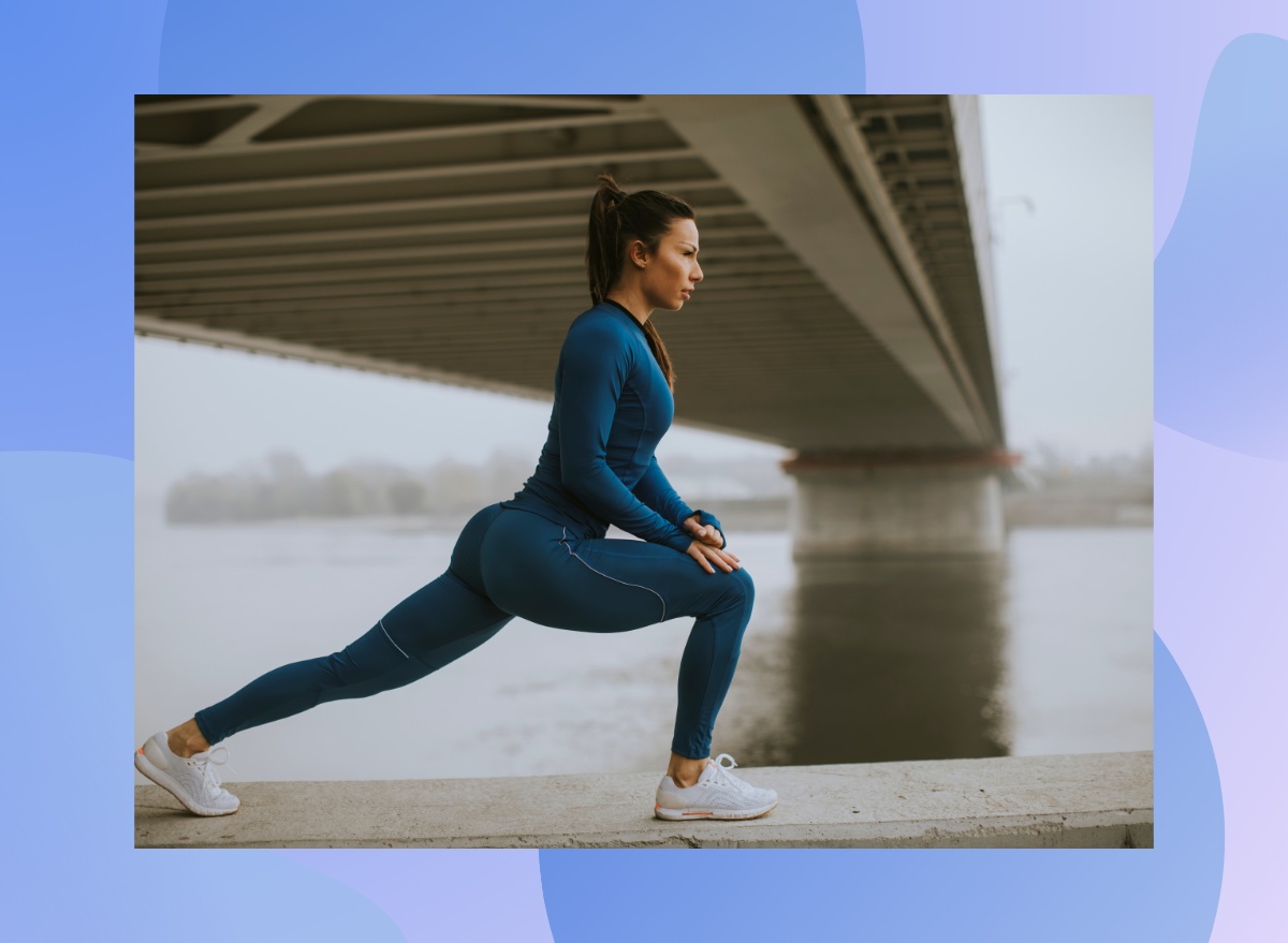 fit woman doing walking lunges outdoors