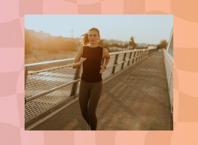 woman running or jogging on bridge for exercise at sunset