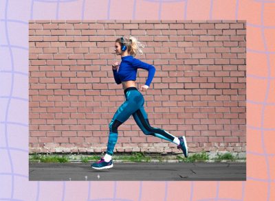 blonde woman with headphones on running outdoors for exercise