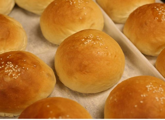 Fuddruckers Freshly Made Burger Buns on a tray