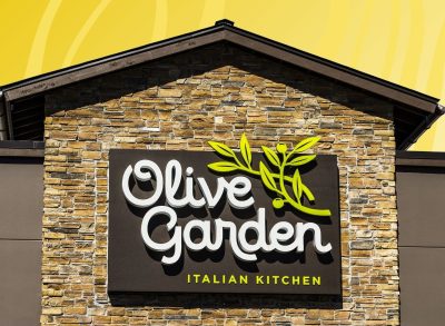 Olive Garden exterior on colorful yellow background