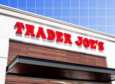 Trader Joe's storefront on blue background with white grid pattern