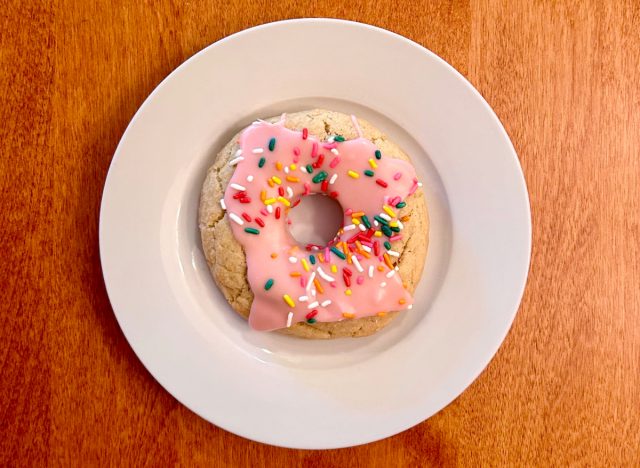 Crumbl's Pink Doughnut Cookie on a white plate