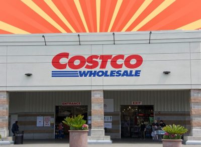 Costco exterior on yellow and red striped background