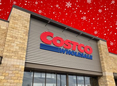 Costco storefront on red background covered in snowflakes