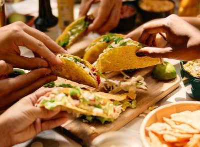 generic image of Mexican food, including tacos and chips