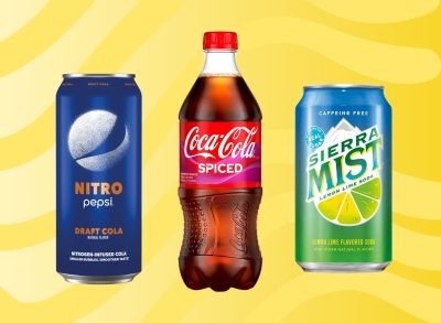 A trio of discontinued soda flavors set against a vibrant background.