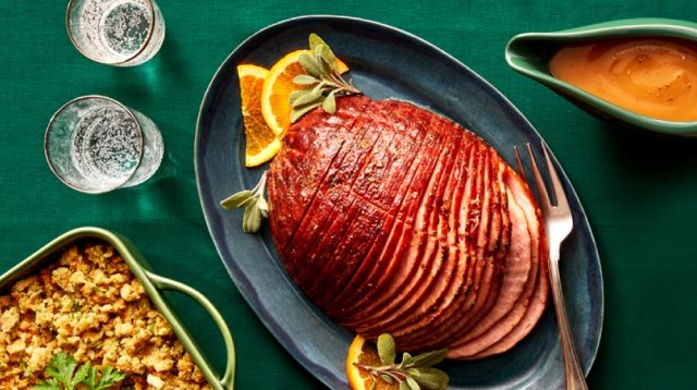 Walmart Holiday Ham meal sitting on green table