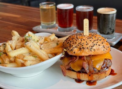 A burger, fries, and flight of beers from Yard House