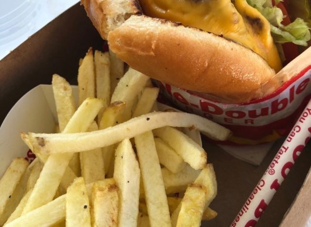 in-n-out fries light next to a double double burger