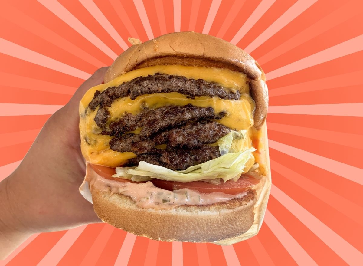 in-n-out's 4x4 burger set against a colorful designed background