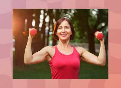 fit middle-aged brunette woman lifting lightweight dumbbells