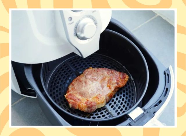 a photo of pork chops in an air fryer