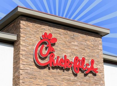 Chick-fil-A store on striped blue background