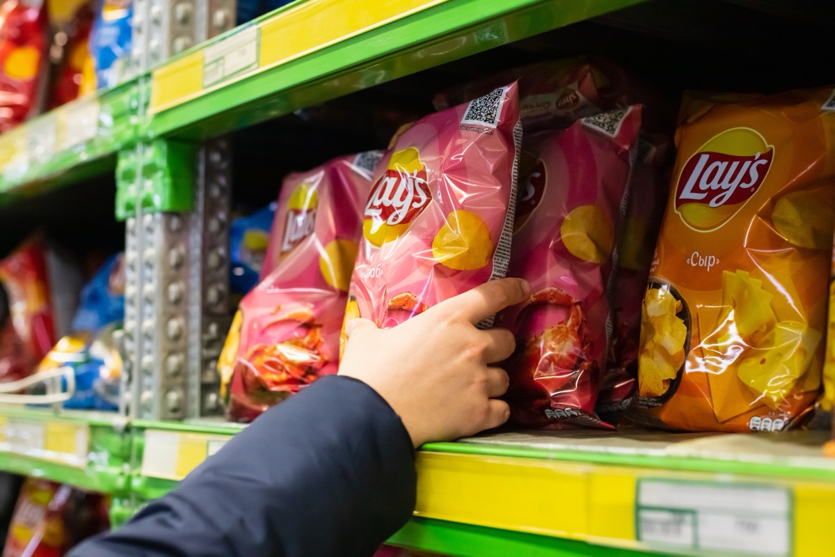 Lays potato chips packaging on store shelf