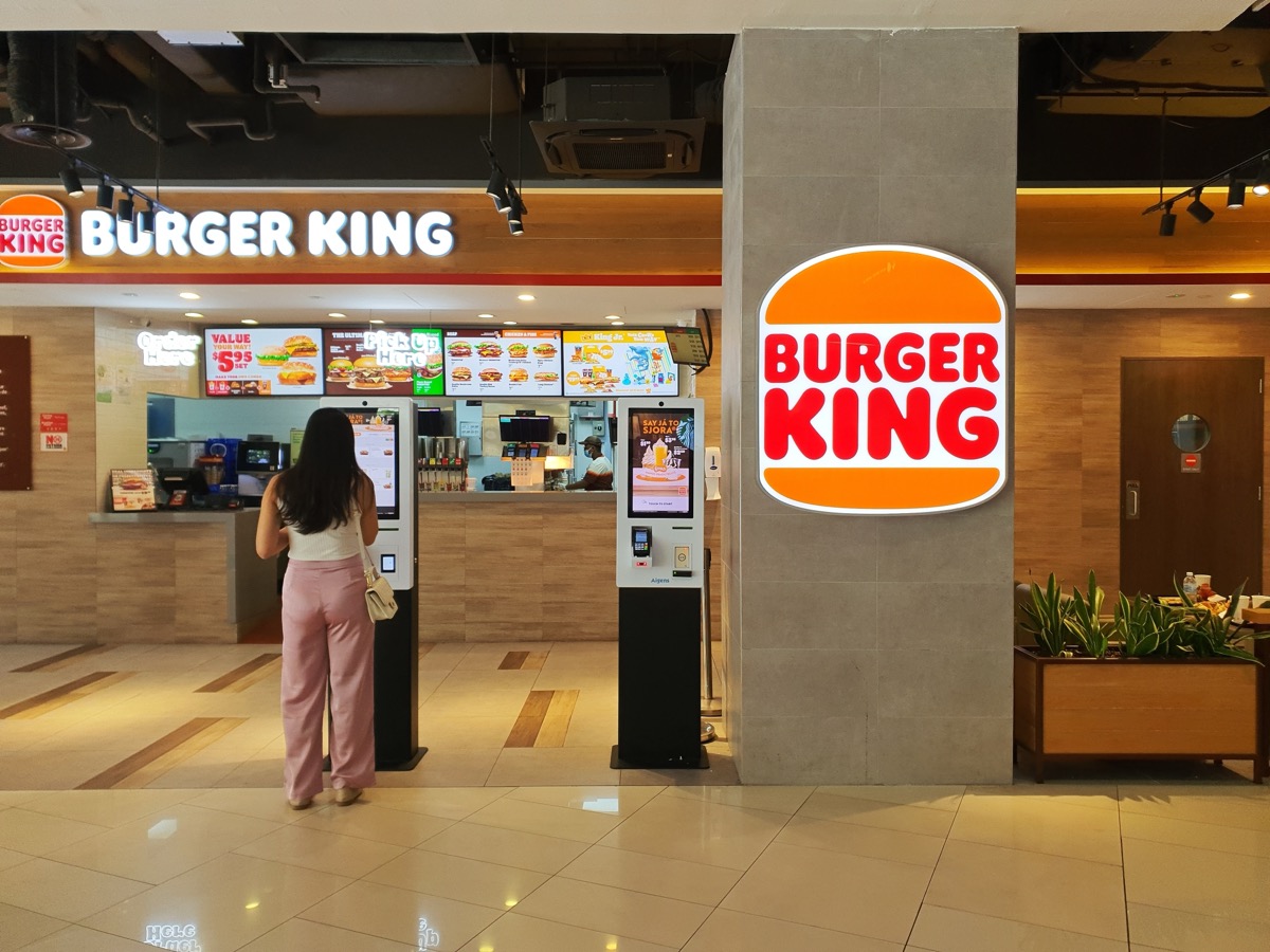 Singapore May 5 2024 customer order food at the self serve panel at Burger King fast food store at kinex mall