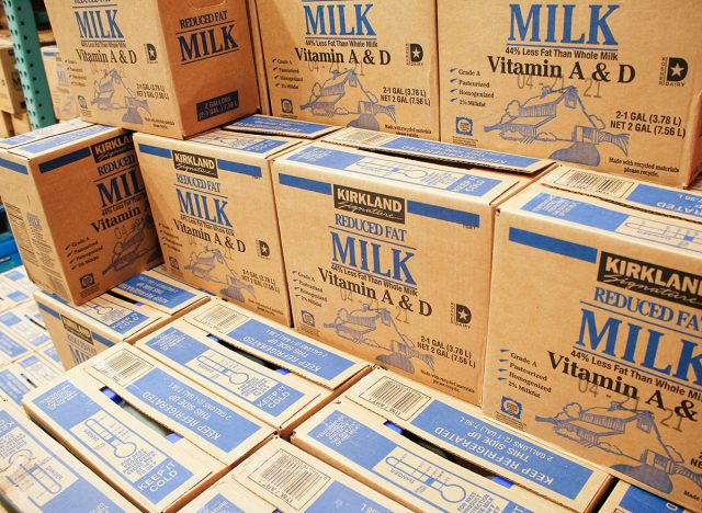 A view of several cases of Kirkland Signature reduced fat milk - vitamin A and vitamin D, on display at a local Costco store.