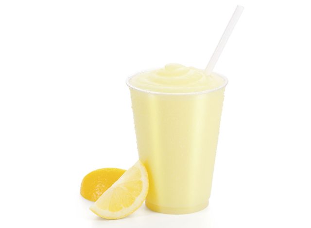 Frozen Lemonade or Lemon Smoothie with Straw and Garnish on White Background