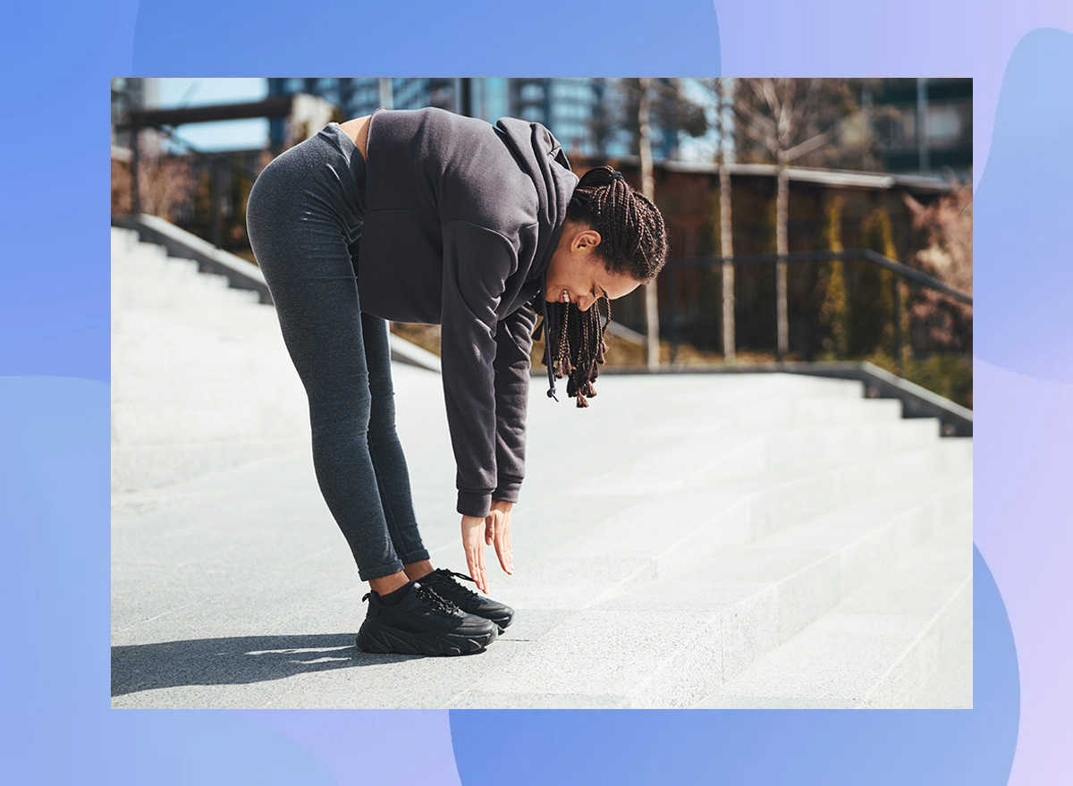 Woman touching her toes