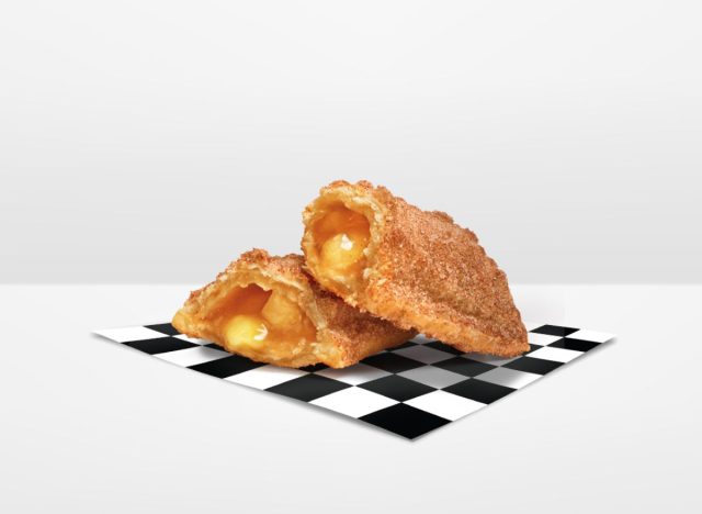 Checkers and Rally's Apple Pie on a black and white checkered napkin