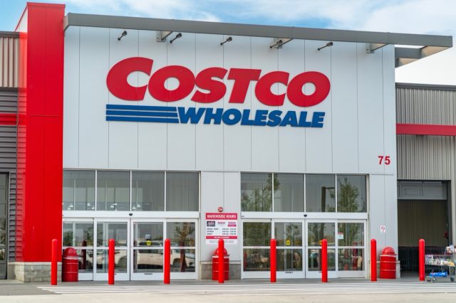 Calgary, Alberta, Canada - September 3, 2022 : The entrance to a Costco Wholesale store is seen. Costco Wholesale Corporation operates a chain of warehouse style members only club stores.