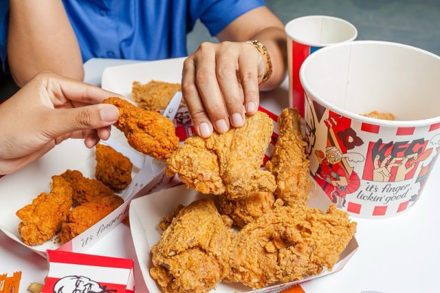 KFC is popular fast food chain known as Kentucky Fried Chicken.background of KFC restaurant.selective focus.THAILAND,15 May 2023.