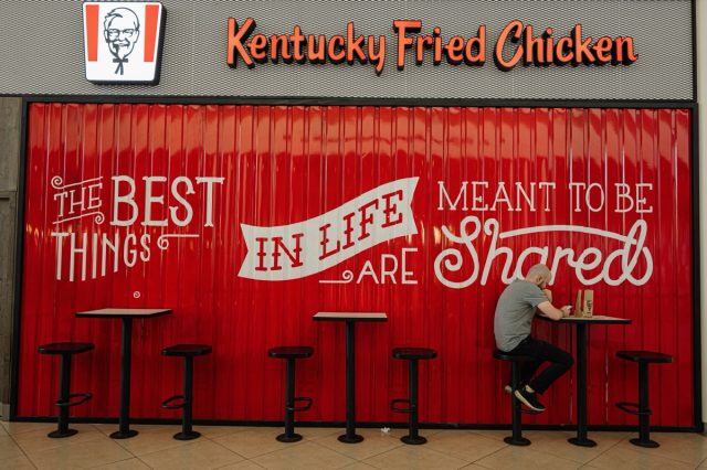 Lviv, Ukraine - October 09, 2022: KFC, Kentucky Fried Chicken. The best things in life meant to be shared.