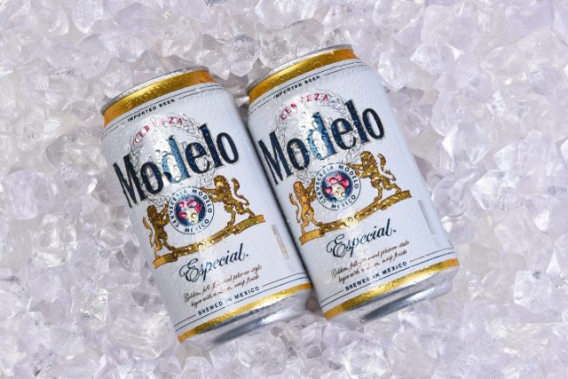 IRVINE, CALIFORNIA - 5 JUNE 2023: Two cans of Modelo Especial on ice. First bottled in 1925, Modelo Especial is one of the top imported beers in the U.S. by case sales.