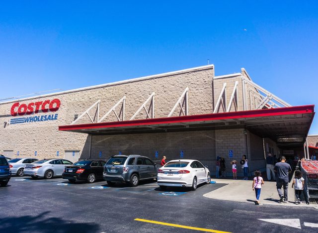 Exterior view of the Mountain View Costco Wholesale store in south San Francisco bay area; People walking towards the entrance